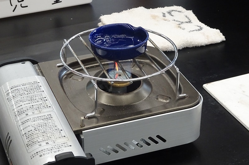 Part 2: Saltwater filtration experiment using hollow fiber membrane. Students check if the filtered solution contains salt.