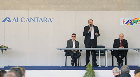 Chairman and CEO (center) speaking at the event 
