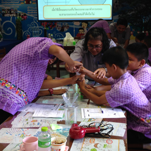 Students working on an experiment using hollow fibers