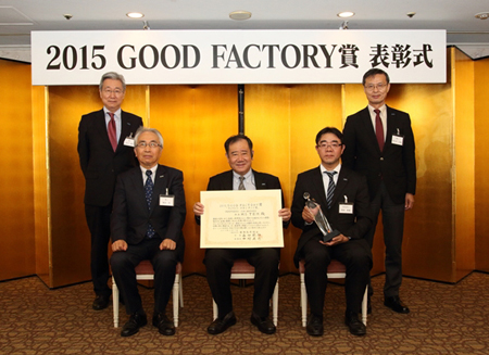 2015 GOOD FACTORY AWARDs winners. Front row, from left - Umeda, Teh and Okada Back row - Naoyuki Kinoshita, General Manager of Manufacturing Planning & Administration Dept., Toray, and Sasaki