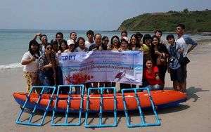 Group picture of staff members before taking the coral down to the seabed