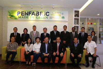 Group photo. Chief Minister is in the front row fourth from left