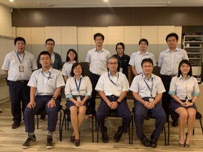 The interns with the heads of the departments that took them in, after the presentation. The interns are in the back row, second to fourth from right