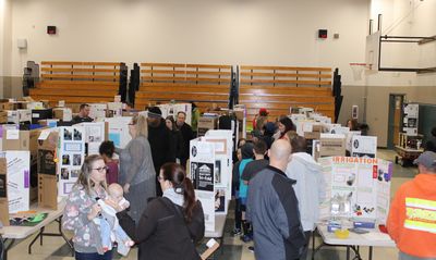 Over a hundred students and parents attended the Engineering Showcase held at Elk Plain’s gymnasium that was packed with display boards, models, journals, and more