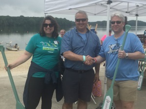 The awards ceremony of the Dragon Boat Race. From left to right: Decatur Morgan Hospital Foundation President Noel Lovelace; CMA President & CEO Dennis Frett; and CMA Decatur Plant Manager Andrew Matthews