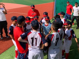 Forming a circle before the offense in the preliminary league game against Taiwan