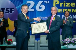 MTSF Chairman Omar (right) receives Foreign Minister’s Commendations from Ambassador Oka