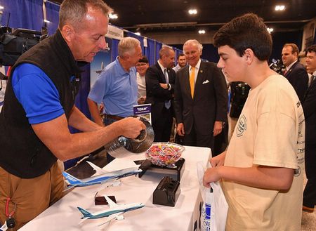 Governor McMaster (center, wearing necktie) also visited the CMA booth. To the left of the governor is Tom Hinrichs, Deputy General Manager of Spartanburg Plant, in a polo shirt