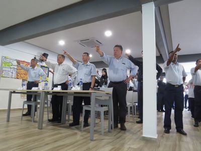 Participants making the safety pledge