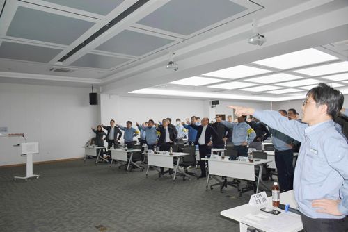 Pointing and calling of the safety slogan by all participants