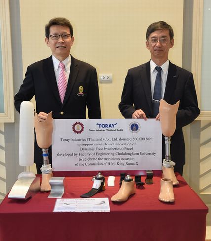 TTH President Takabayashi (right) with Professor Supot (left)