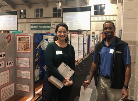 Mary Willard, Human Resources/General Affairs Manager (left) and William Reynolds, Senior Engineer, Mechanical, Maintenance (right) at the science fair