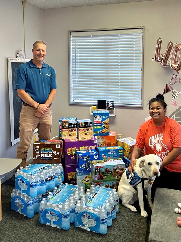 Donations and volunteering for the Day of Caring event, organized by a charity (Toray Composite Materials America, Inc.)