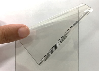Flexible touch sensor panel utilizing RAYBRID™